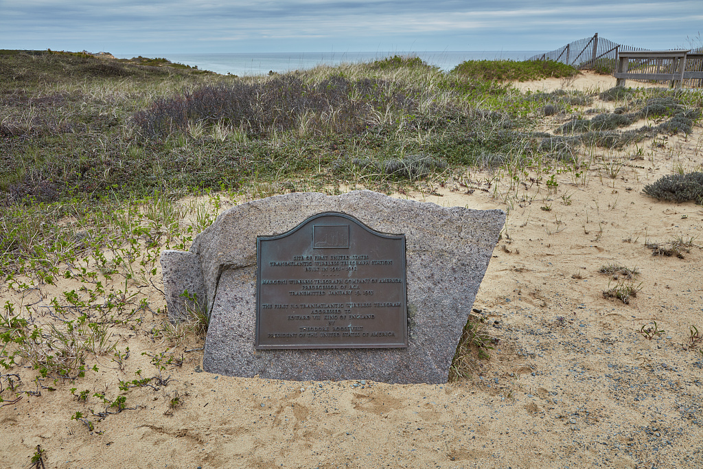 Bronze plaque marking the Marconi Wireless Station site in South Wellfleet, Massachusetts, on Cape Cod